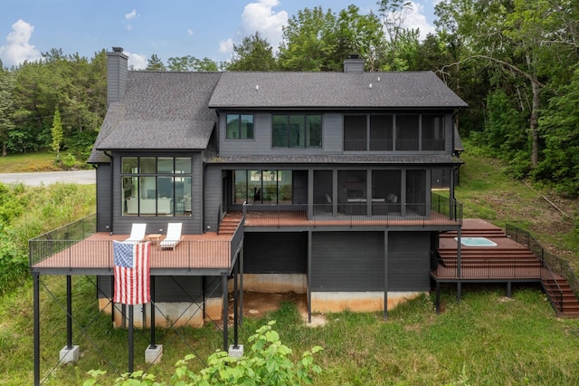 928 Harbor Pointe Dr, Silver Point, TN 38582 - back of house with a chimney, a wooden deck, and a shingled roof