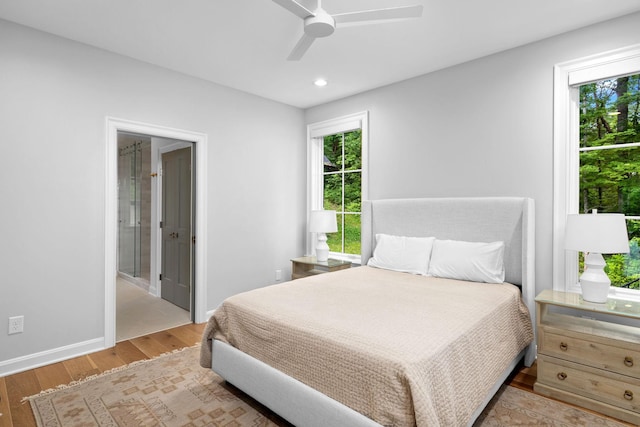 928 Harbor Pointe Dr, Silver Point, TN 38582 - bedroom with wood finished floors, recessed lighting, connected bathroom, and a ceiling fan