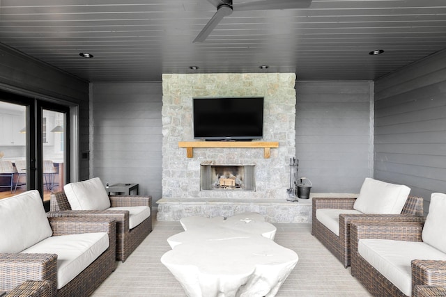 928 Harbor Pointe Dr, Silver Point, TN 38582 - living room featuring an outdoor stone fireplace and wood walls