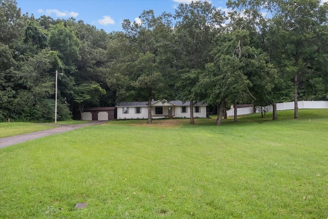 1122 Ridgecrest Dr, Dickson, TN 37055 - ranch-style home with asphalt driveway and an attached garage