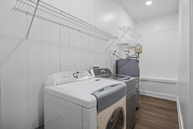 1122 Ridgecrest Dr, Dickson, TN 37055 - laundry area with washer and clothes dryer, dark wood finished floors, and electric water heater