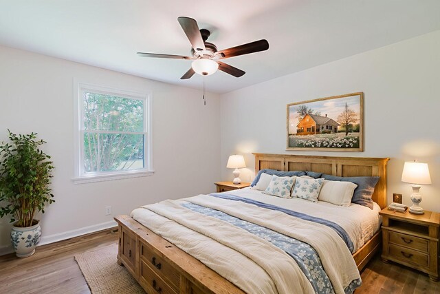 143 Bishop Ln, Burns, TN 37029 - bedroom featuring wood finished floors and ceiling fan