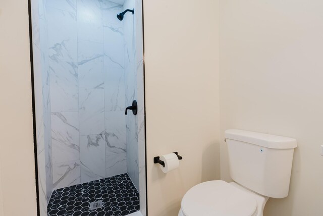 143 Bishop Ln, Burns, TN 37029 - full bathroom with toilet and a marble finish shower
