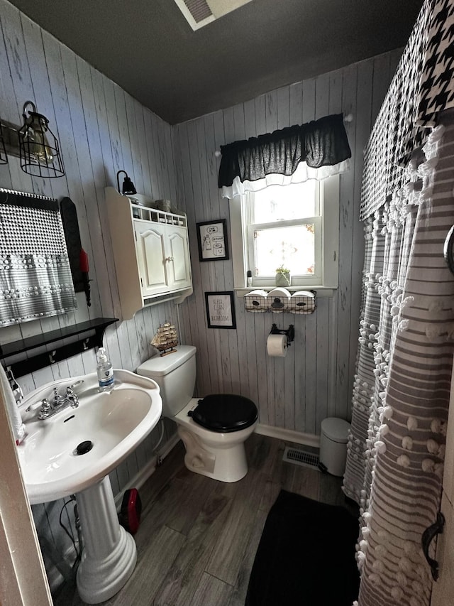 123 Coffman Dr, Fort Oglethorpe, GA 30742 - bathroom with wood finished floors and wooden walls