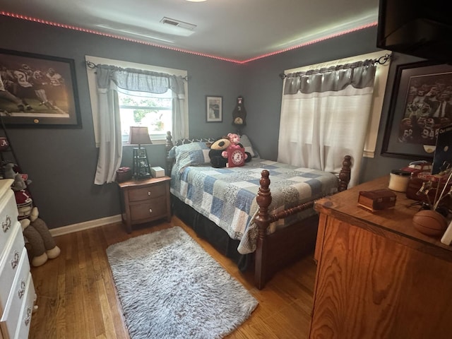 123 Coffman Dr, Fort Oglethorpe, GA 30742 - bedroom with light wood-style floors and baseboards