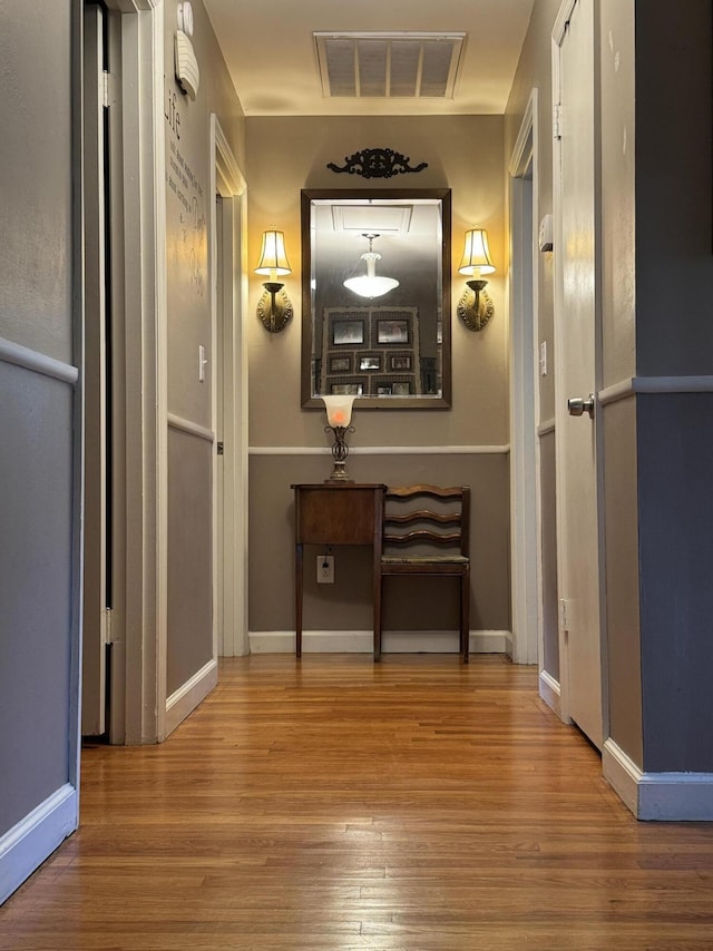 123 Coffman Dr, Fort Oglethorpe, GA 30742 - corridor featuring wood finished floors and baseboards