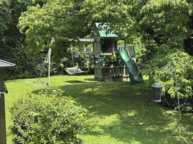 123 Coffman Dr, Fort Oglethorpe, GA 30742 - view of grassy yard featuring a playground