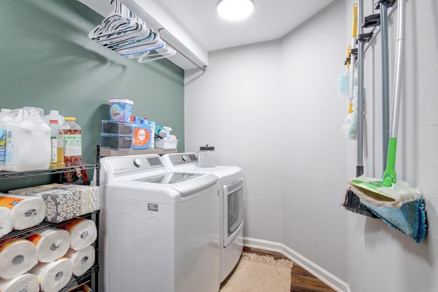 3150 Sugar Creek Rd, Woodlawn, TN 37191 - washroom featuring independent washer and dryer and wood finished floors