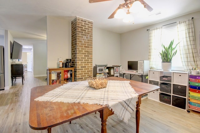 3150 Sugar Creek Rd, Woodlawn, TN 37191 - dining space with light wood-style flooring and a ceiling fan
