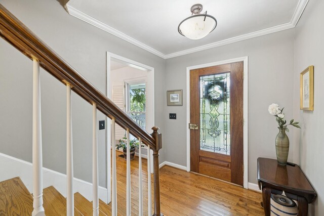 1201 Natchez Rd, Franklin, TN 37069 - foyer featuring light wood finished floors, ornamental molding, and stairway