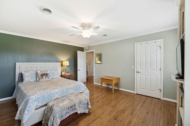 1201 Natchez Rd, Franklin, TN 37069 - bedroom with wood finished floors, crown molding, and a ceiling fan