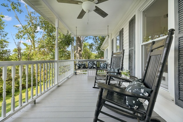 1201 Natchez Rd, Franklin, TN 37069 - wooden porch with a ceiling fan