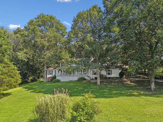 1201 Natchez Rd, Franklin, TN 37069 - view of green lawn with a porch