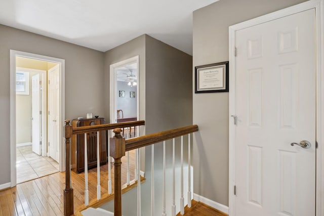 1201 Natchez Rd, Franklin, TN 37069 - hall with an upstairs landing and light wood-style floors