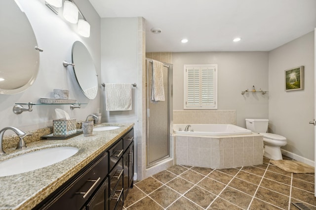 1201 Natchez Rd, Franklin, TN 37069 - bathroom featuring a garden tub, double vanity, a stall shower, tile patterned flooring, and recessed lighting