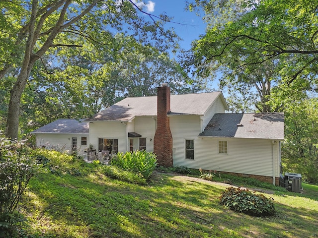 1201 Natchez Rd, Franklin, TN 37069 - back of house featuring a chimney and a yard