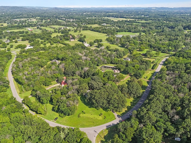1201 Natchez Rd, Franklin, TN 37069 - aerial view of property and surrounding area with a heavily wooded area
