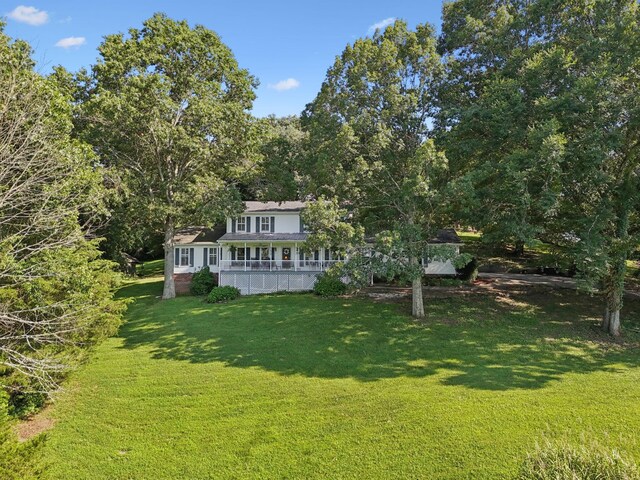 1201 Natchez Rd, Franklin, TN 37069 - view of front of property featuring a front yard and a porch