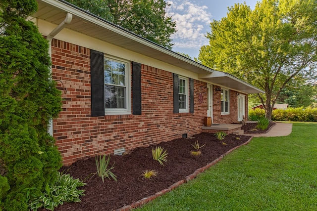 1150 Mattox Town Rd, Lawrenceburg, TN 38464 - view of home's exterior featuring a yard and brick siding