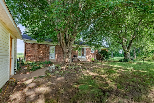 1150 Mattox Town Rd, Lawrenceburg, TN 38464 - view of green lawn featuring entry steps