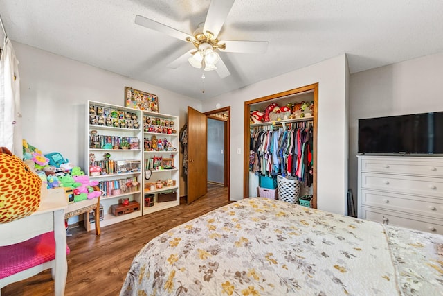 1150 Mattox Town Rd, Lawrenceburg, TN 38464 - bedroom with wood finished floors, a closet, and a ceiling fan