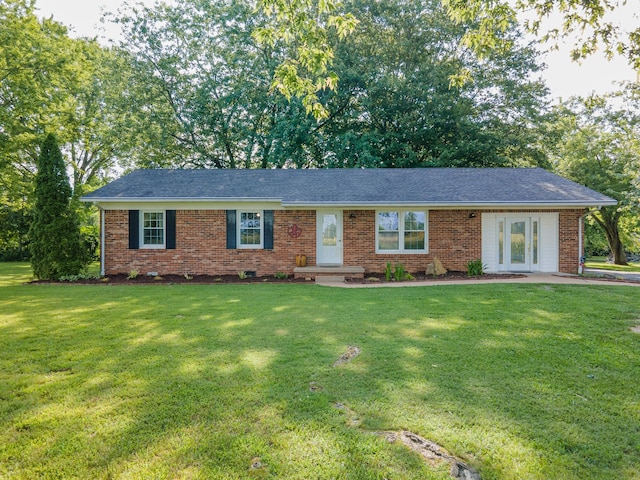 1150 Mattox Town Rd, Lawrenceburg, TN 38464 - ranch-style house with a front lawn, brick siding, and french doors