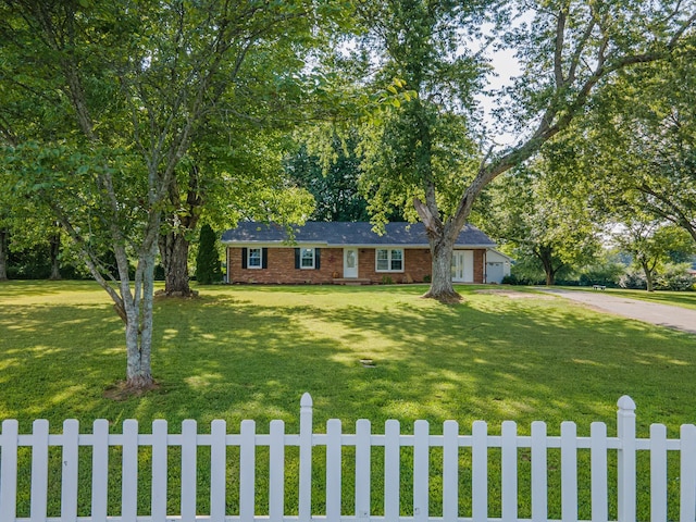 1150 Mattox Town Rd, Lawrenceburg, TN 38464 - ranch-style house with dirt driveway, brick siding, and an attached garage
