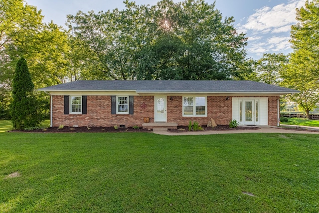 1150 Mattox Town Rd, Lawrenceburg, TN 38464 - single story home featuring a front lawn, french doors, and brick siding