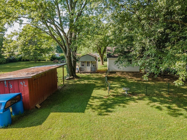 1150 Mattox Town Rd, Lawrenceburg, TN 38464 - view of grassy yard featuring an outdoor structure