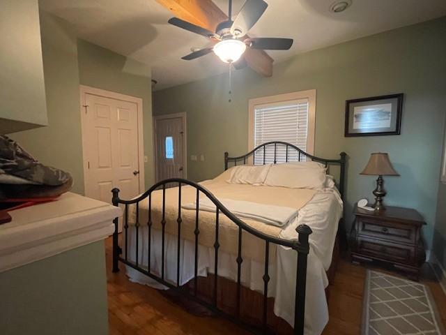 29 Bradley Ln, Bath Springs, TN 38311 - bedroom with wood finished floors and a ceiling fan