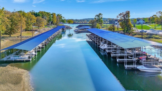 29 Bradley Ln, Bath Springs, TN 38311 - view of home's community with a water view and a dock