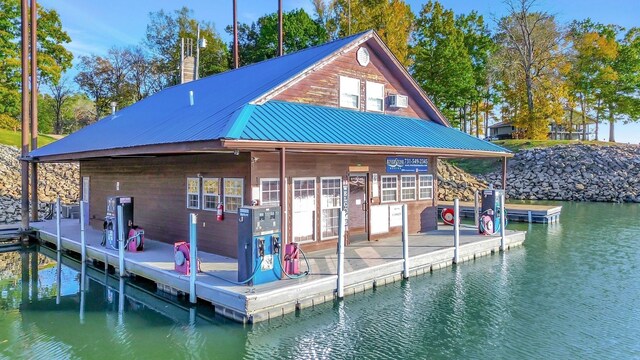 29 Bradley Ln, Bath Springs, TN 38311 - dock featuring a water view
