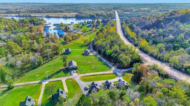 29 Bradley Ln, Bath Springs, TN 38311 - aerial overview of property's location with a large body of water and a heavily wooded area