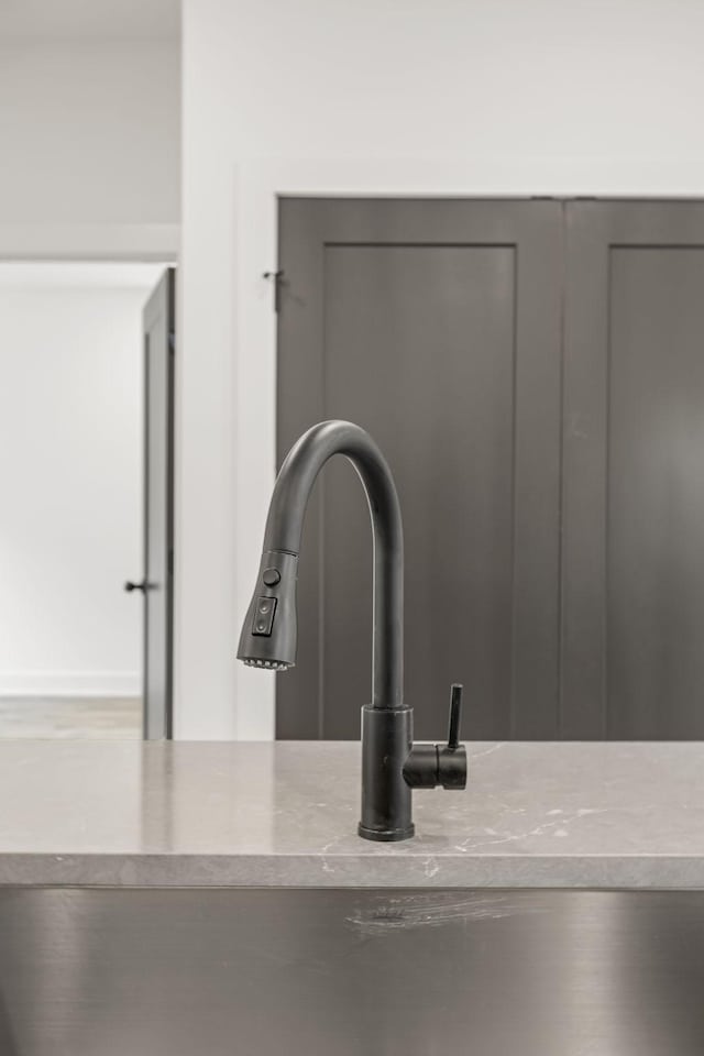 1111 W End Ave N, Lewisburg, TN 37091 - detailed view of gray cabinets and light countertops