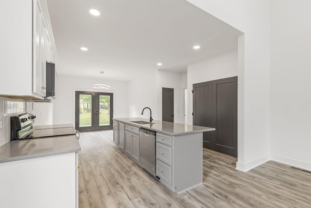 1111 W End Ave N, Lewisburg, TN 37091 - kitchen with electric range, dishwasher, french doors, light wood finished floors, and recessed lighting