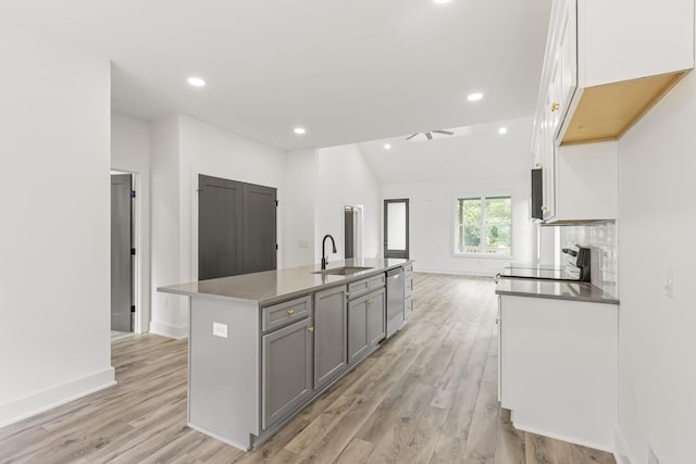 1111 W End Ave N, Lewisburg, TN 37091 - kitchen featuring stainless steel dishwasher, range, gray cabinetry, light wood-style flooring, and recessed lighting