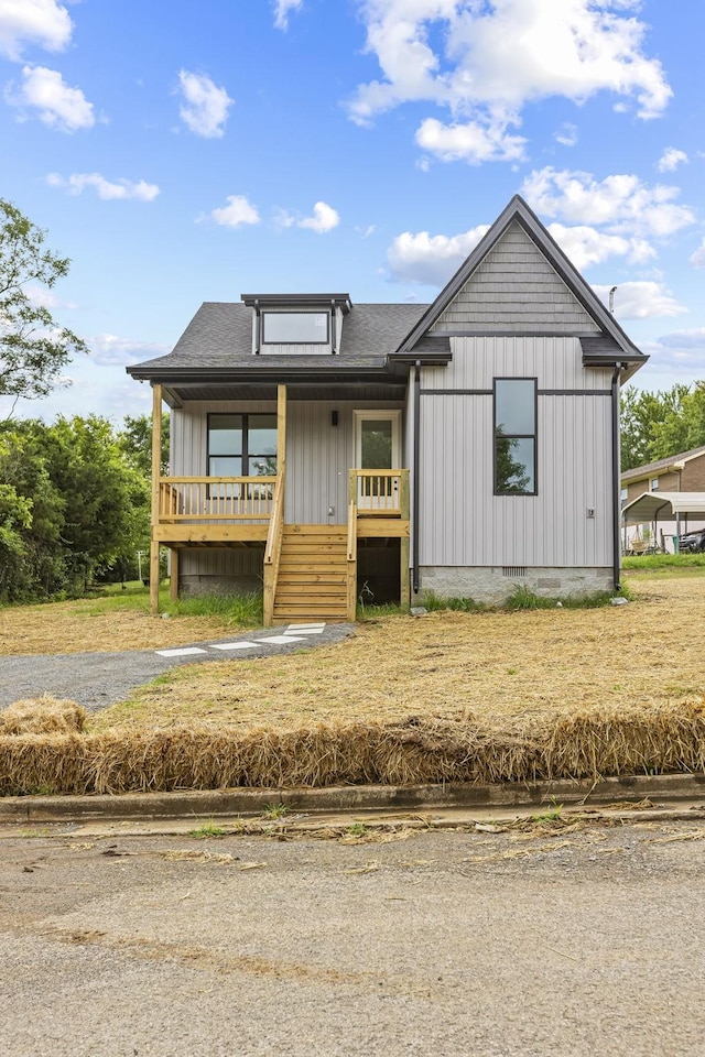 1111 W End Ave N, Lewisburg, TN 37091 - view of front facade featuring covered porch, crawl space, and stairway