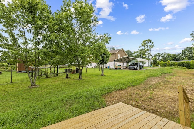 1111 W End Ave N, Lewisburg, TN 37091 - view of grassy yard with a detached carport and a wooden deck