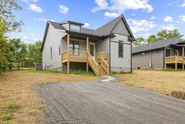 1111 W End Ave N, Lewisburg, TN 37091 - view of front of property with a porch, crawl space, and roof with shingles