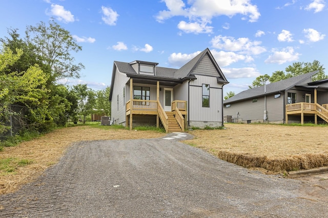 1111 W End Ave N, Lewisburg, TN 37091 - view of front of home featuring a porch, crawl space, and stairs
