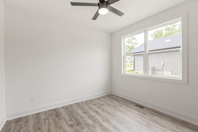 1111 W End Ave N, Lewisburg, TN 37091 - unfurnished room with light wood finished floors and a ceiling fan