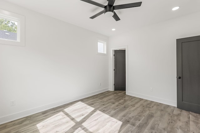 1111 W End Ave N, Lewisburg, TN 37091 - empty room with healthy amount of natural light, ceiling fan, light wood-style flooring, and recessed lighting