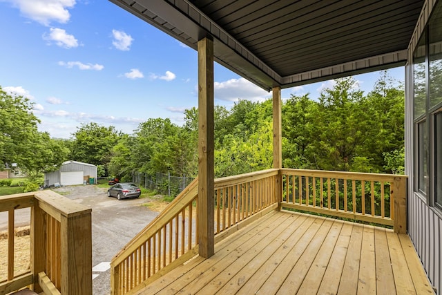 1111 W End Ave N, Lewisburg, TN 37091 - deck with an outdoor structure and a garage