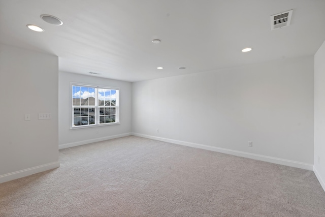 2039 Friendship Dr, Spring Hill, TN 37174 - unfurnished room featuring light colored carpet and recessed lighting