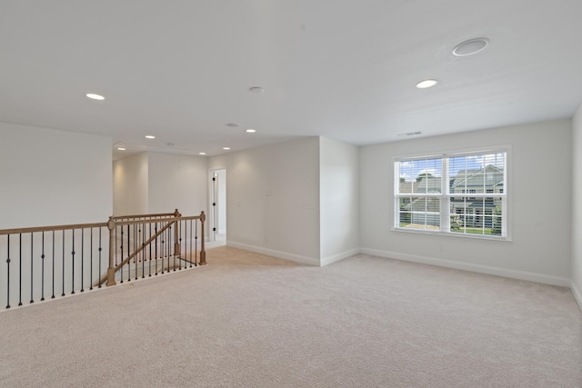2039 Friendship Dr, Spring Hill, TN 37174 - empty room featuring light carpet and recessed lighting