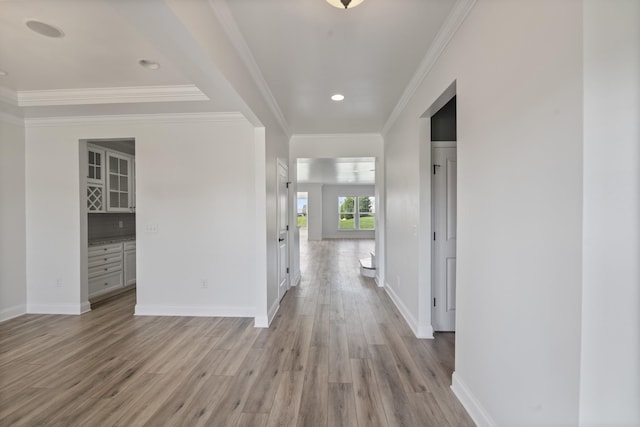 2039 Friendship Dr, Spring Hill, TN 37174 - corridor with light wood finished floors, ornamental molding, and recessed lighting