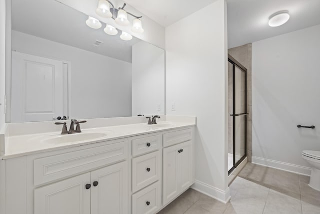 2039 Friendship Dr, Spring Hill, TN 37174 - bathroom featuring a shower stall, double vanity, and tile patterned floors