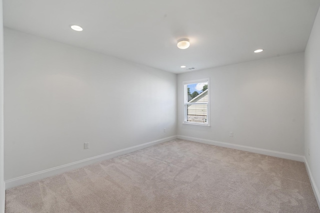 2039 Friendship Dr, Spring Hill, TN 37174 - spare room featuring light carpet and recessed lighting