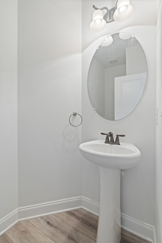 2039 Friendship Dr, Spring Hill, TN 37174 - bathroom with baseboards and wood finished floors