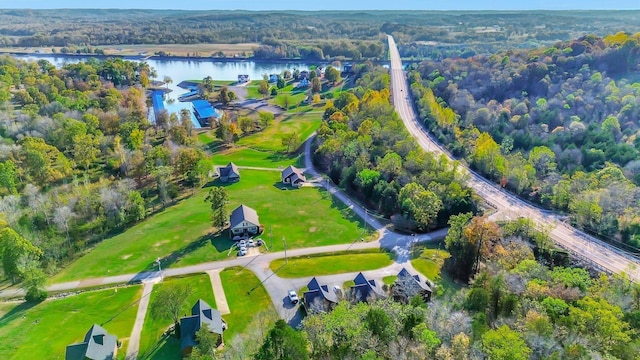 31 Bradley Ln, Bath Springs, TN 38311 - aerial view of property and surrounding area with a large body of water and a forest